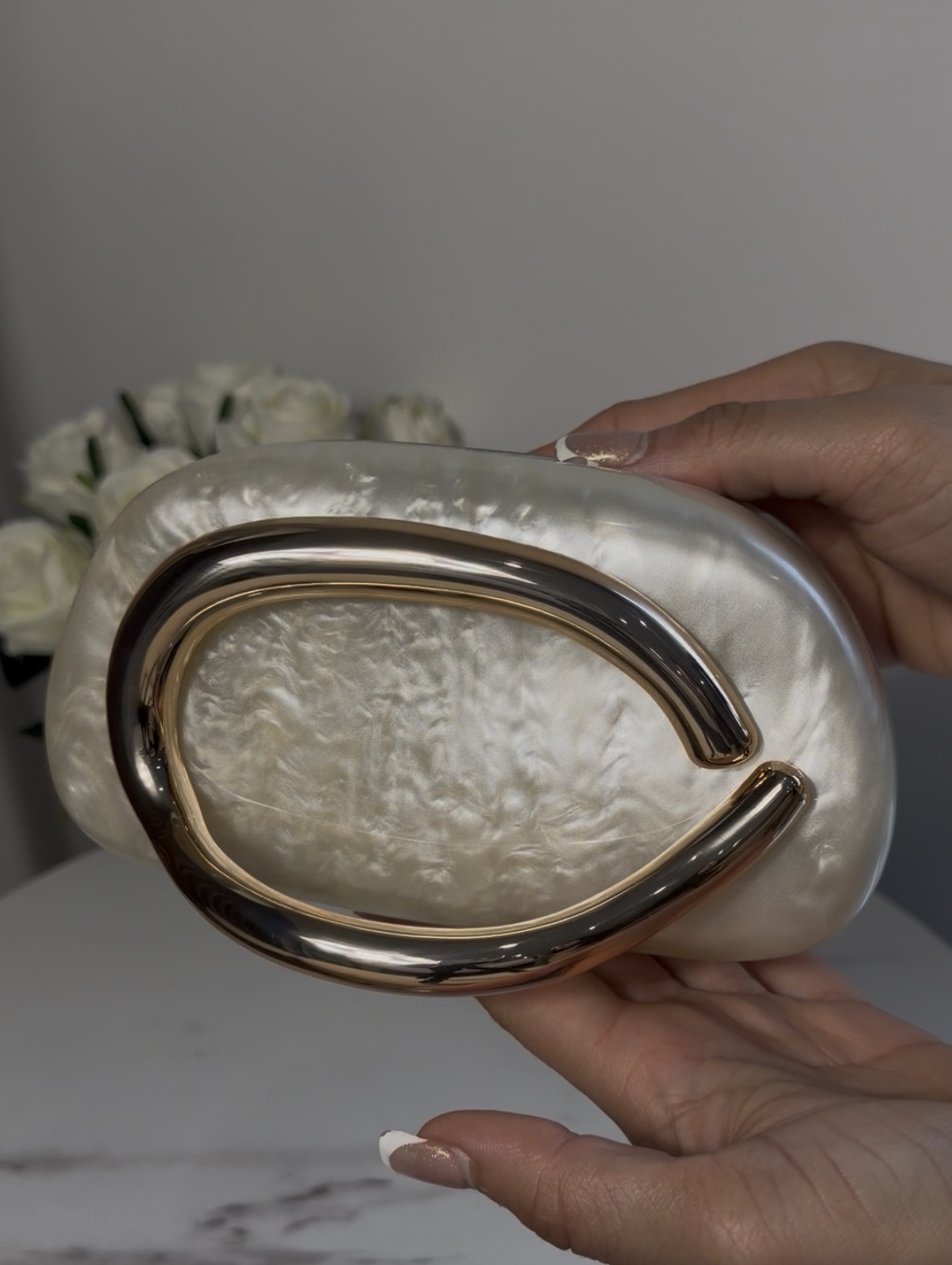 Pearly Oval Clutch